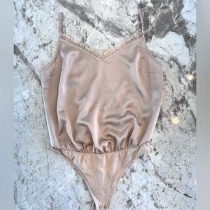 Abercrombie & Fitch “Satin Lace-Back Cami Bodysuit” in color Cream. Size SMALL.